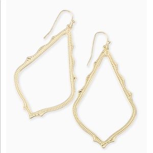 Gold sophee earrings from Kendra scott